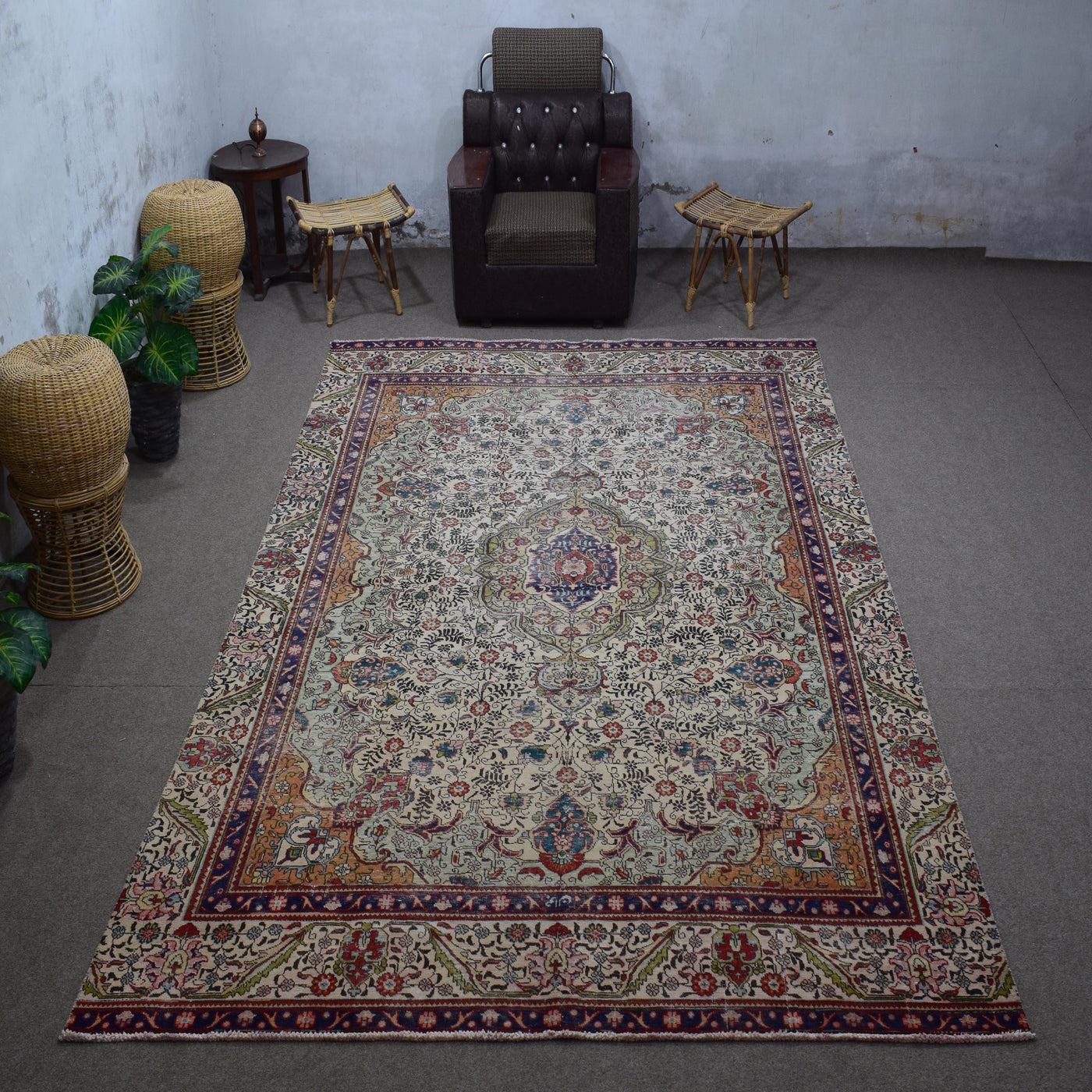 Large distressed vintage Persian rug 242x380 cm styled in interior showing ivory background and classic Persian medallion design