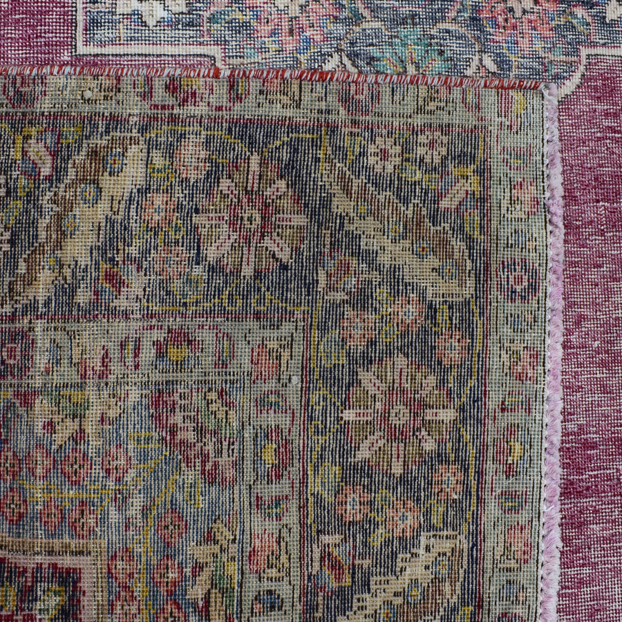 Backside of hand knotted Persian rug showing weave structure and authentic handmade construction
