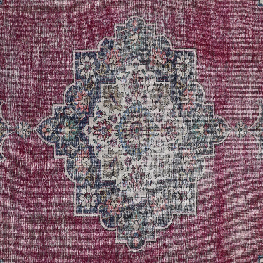 Detailed view of vintage Persian rug medallion featuring traditional Persian floral motifs