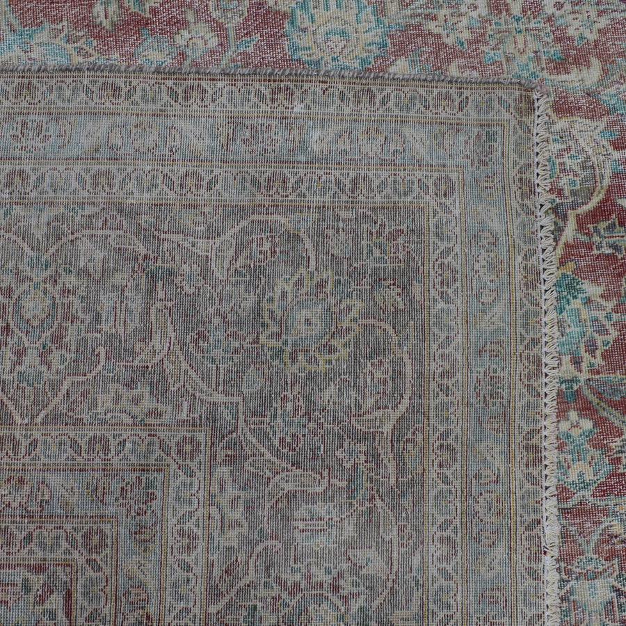 Backside of hand knotted Persian rug showing weave structure and authentic handmade construction
