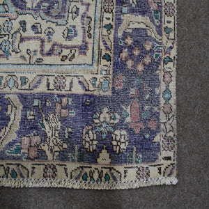 Backside of hand knotted Persian rug showing weave structure and authentic handmade construction