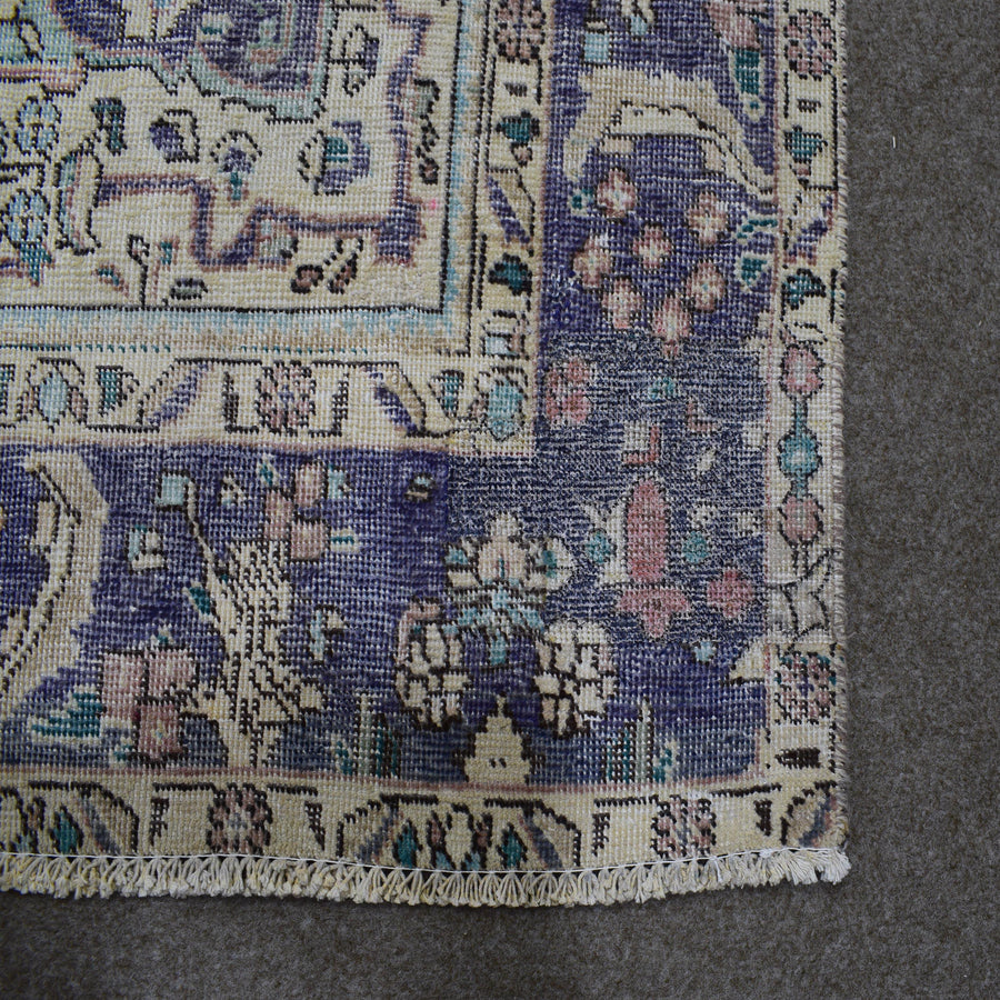 Backside of hand knotted Persian rug showing weave structure and authentic handmade construction