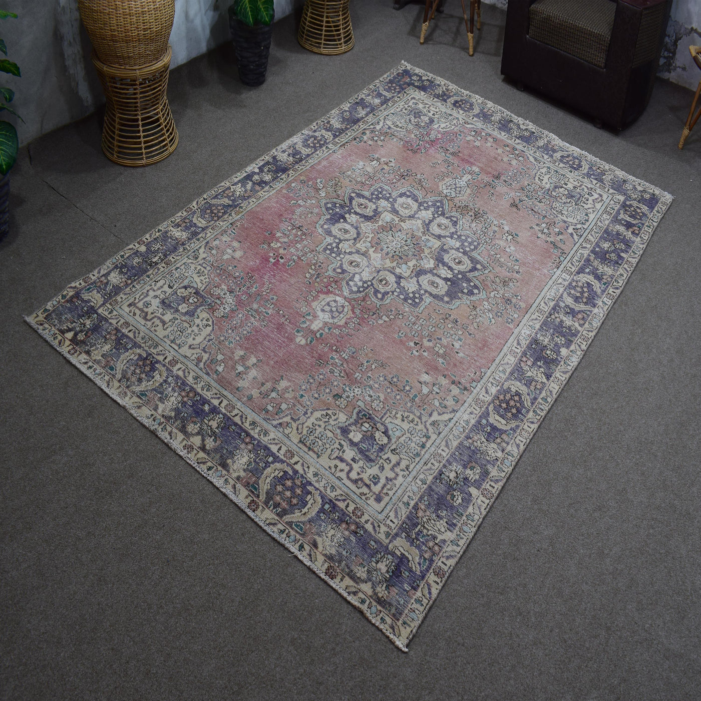 Corner detail of Persian rug with decorative border and classic Persian motifs