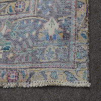 Backside of hand knotted Persian rug showing weave structure and authentic handmade construction
