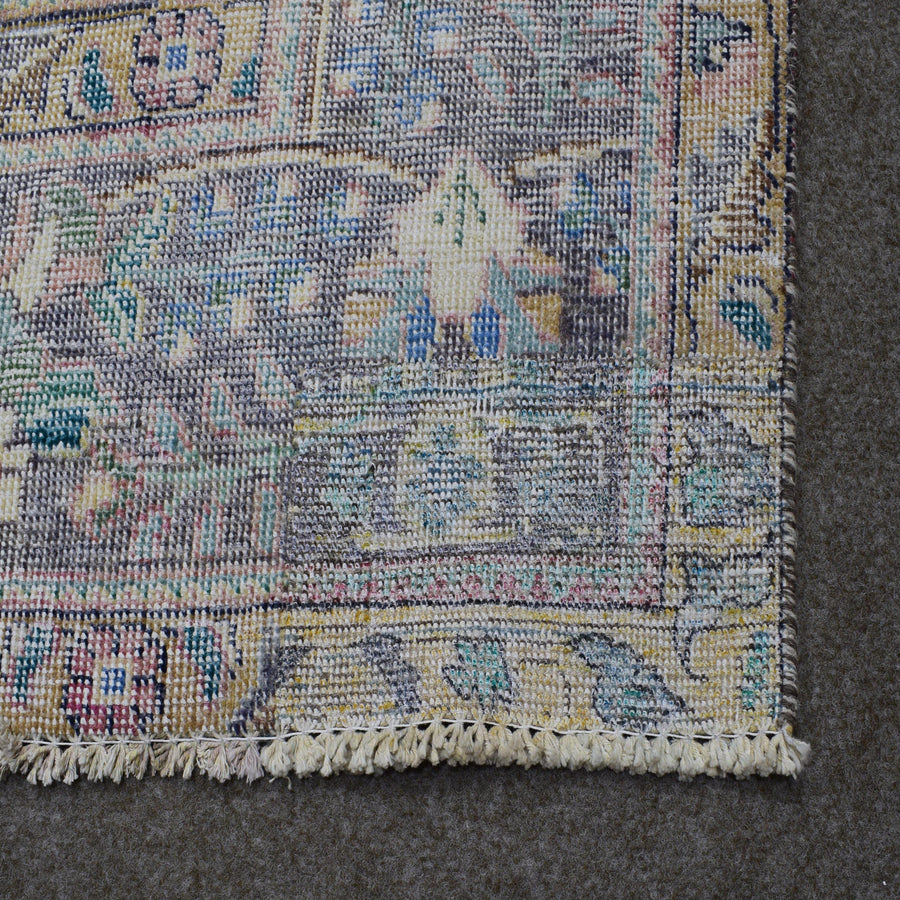 Backside of hand knotted Persian rug showing weave structure and authentic handmade construction