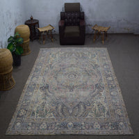 Vintage Persian rug 236x330 cm styled in interior showing soft ivory tones and classic medallion design