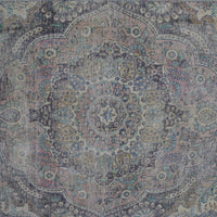 Detailed view of vintage Persian rug medallion featuring traditional Persian floral patterns