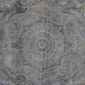 Detailed view of vintage Persian rug medallion featuring traditional Persian floral patterns