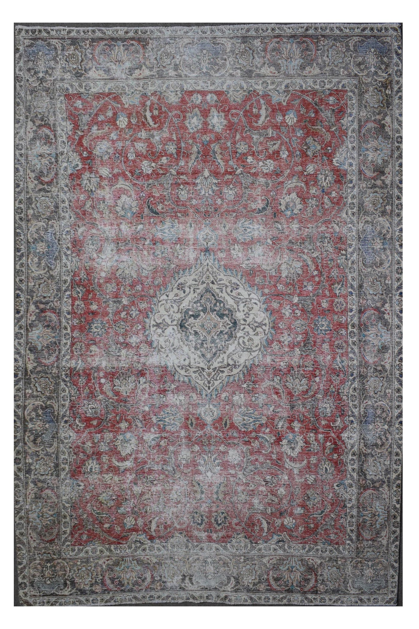 Distressed hand knotted vintage Persian rug 253x327 cm with faded red field and central medallion