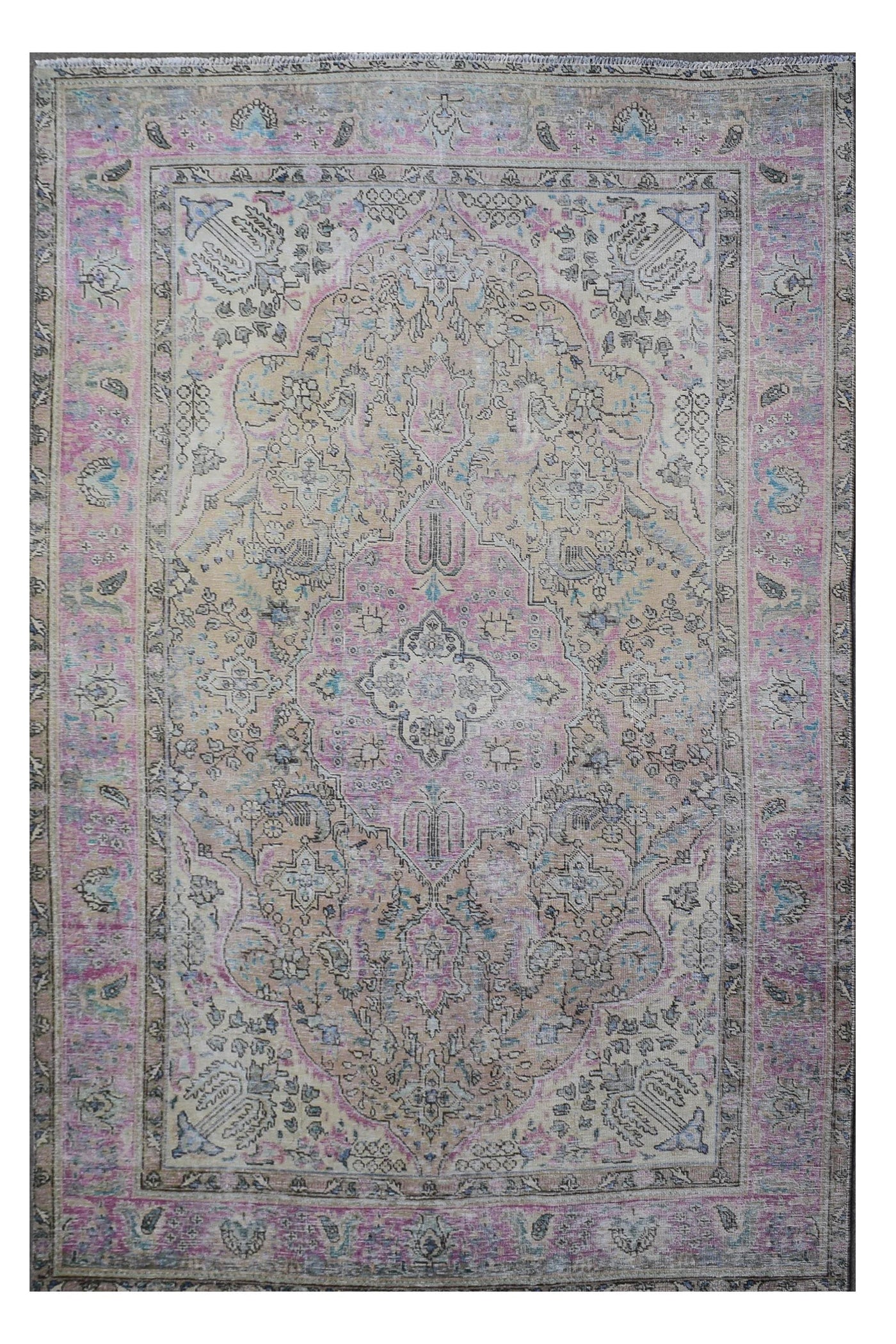 Distressed hand knotted vintage Persian rug 194x292 cm with faded pastel medallion design