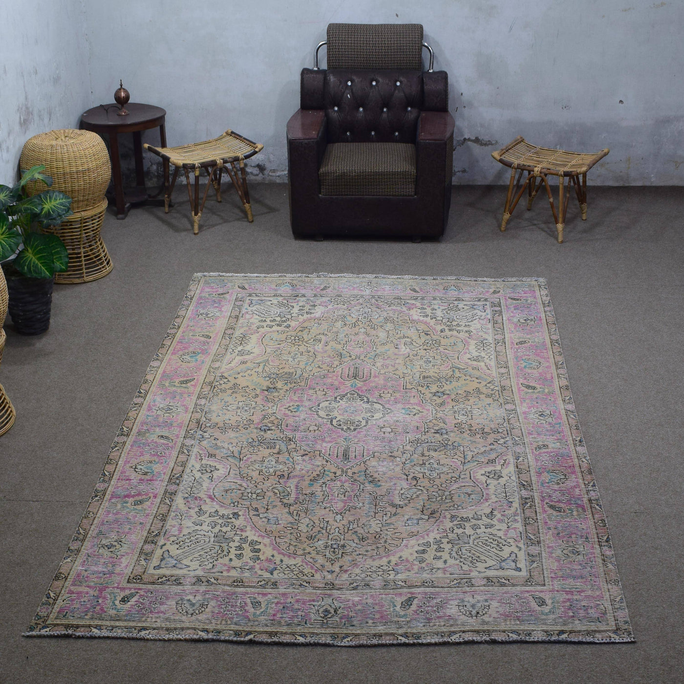 Vintage Persian rug 194x292 cm photographed in interior showing soft distressed tones and central medallion