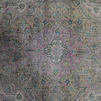 Detailed view of vintage Persian rug center pattern with traditional Persian floral design