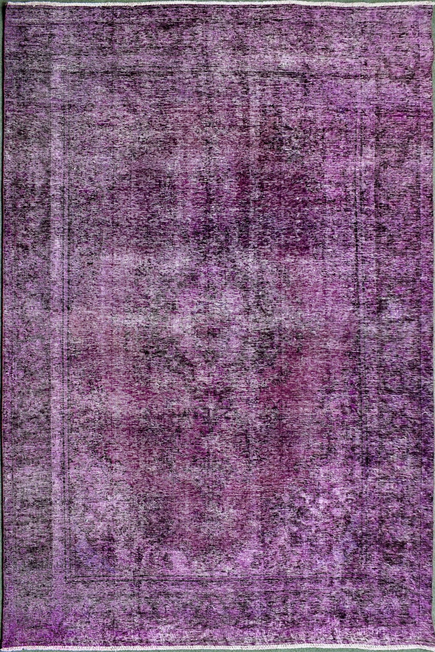 Overdyed hand knotted vintage Persian rug 227x330 cm in rich purple distressed finish
