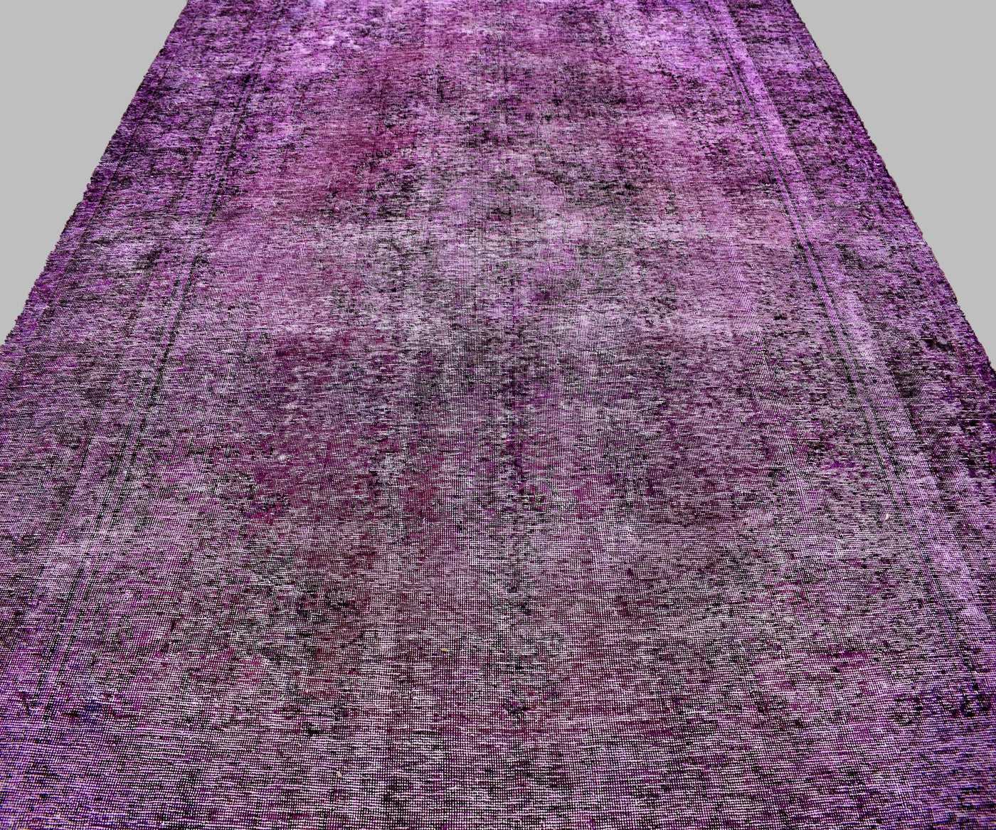 Overdyed Persian rug with antique distressed look and deep violet tonal variations
