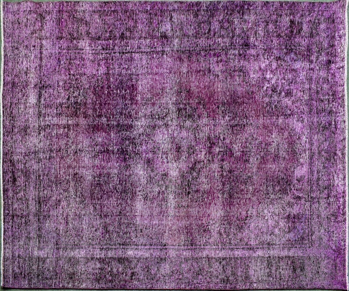 Backside of overdyed vintage Persian rug showing traditional hand knotted construction
