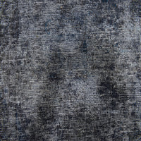 Backside of overdyed vintage Persian rug showing traditional hand knotted construction
