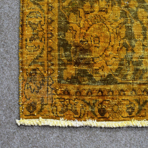 Backside of overdyed vintage Persian rug showing traditional hand knotted construction
