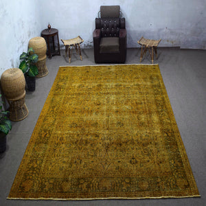 Large overdyed vintage Persian rug 288x383 cm full view showing faded traditional pattern beneath golden wash
